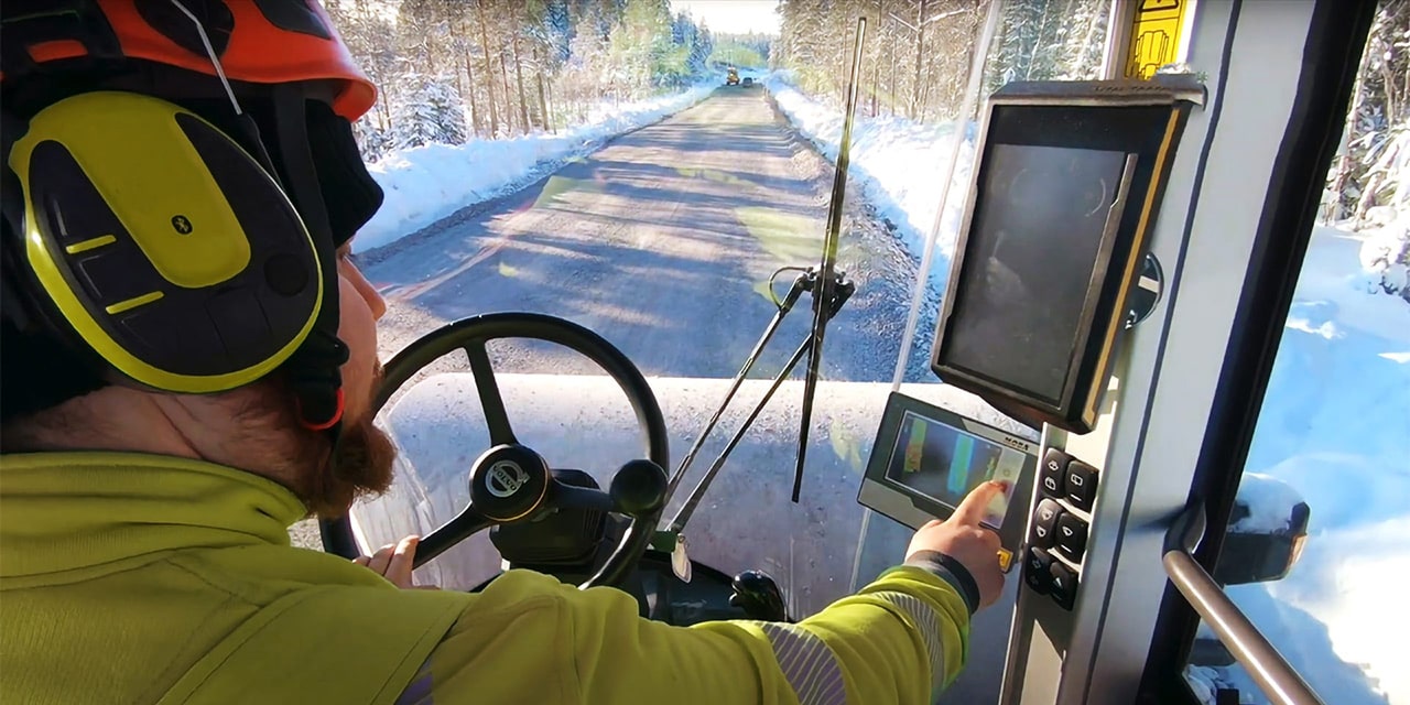 Worker with operating panel MCA in Finland